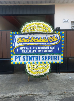 Papan Bunga Duka di Kali Anyar